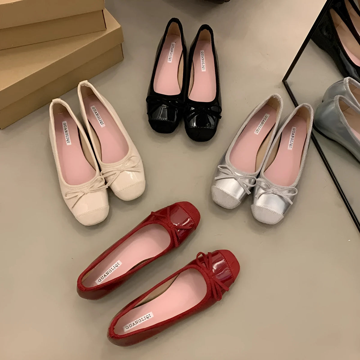 Women's wine red Mary Jane flats with square toe, decorative bow, and a low rubber sole.