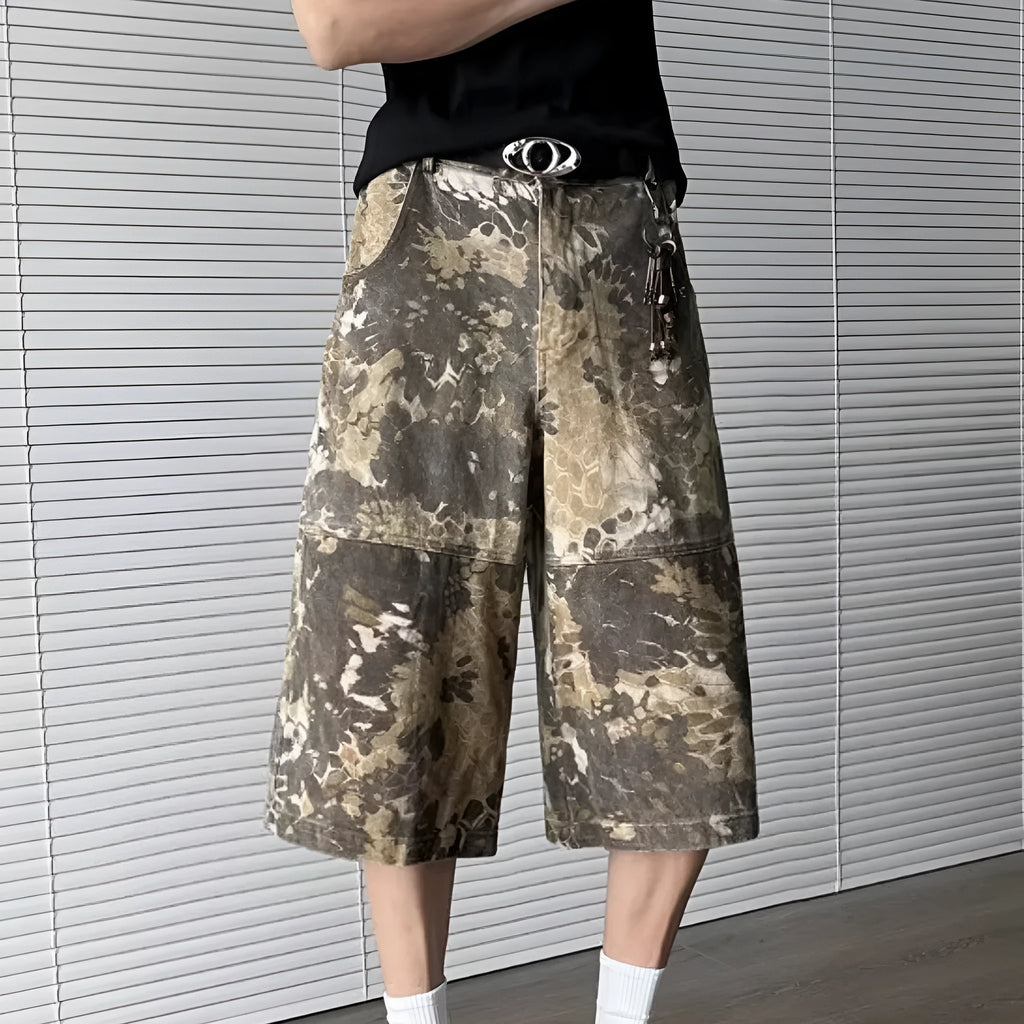 Yellow snake pattern camouflage cropped jeans on a model.