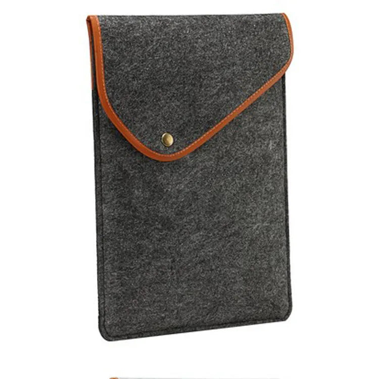 Flat felt computer bag in dark grey with magnetic buckle closure and polyester lining