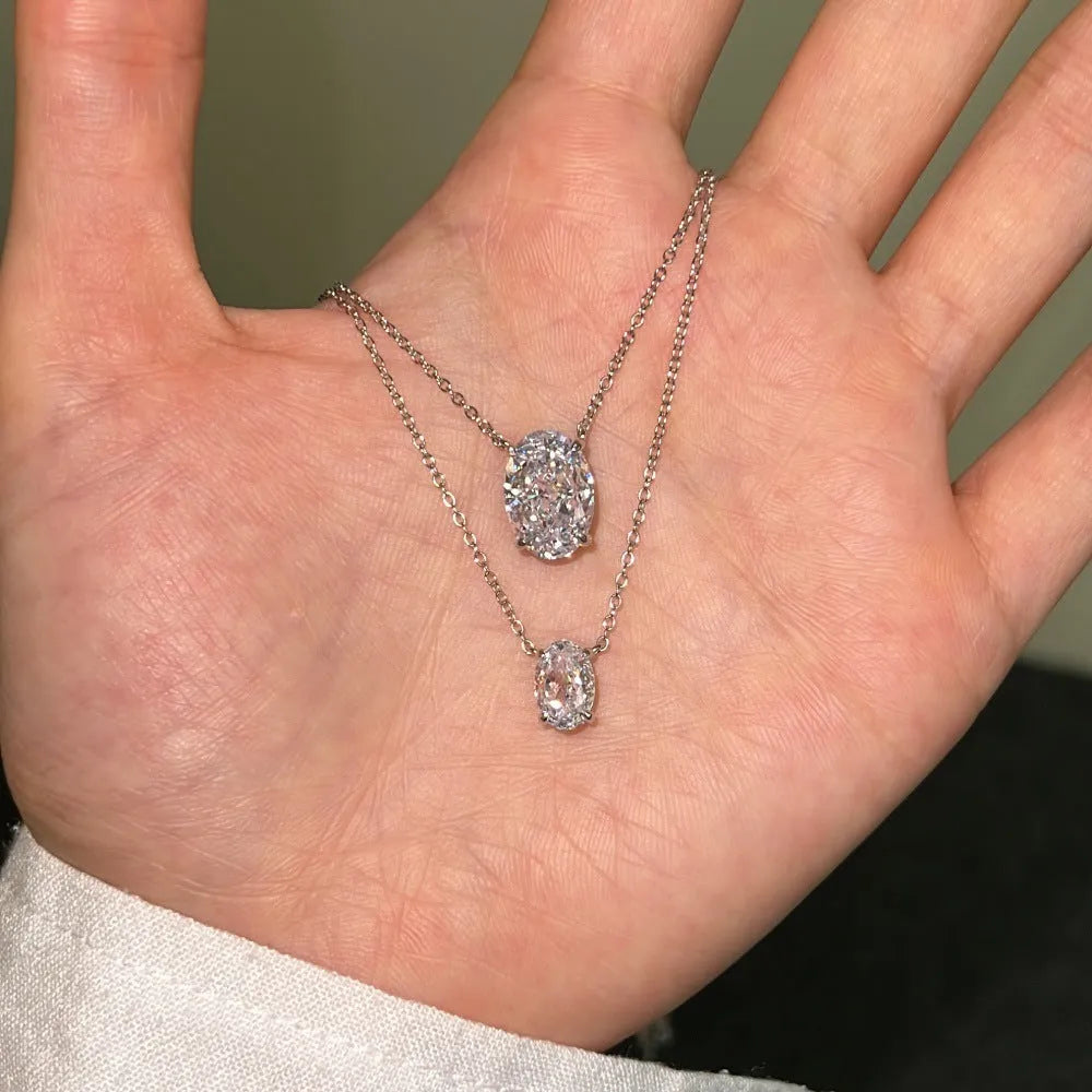 Sterling silver necklace with oval ice flower geometric pendant in gold or platinum finish