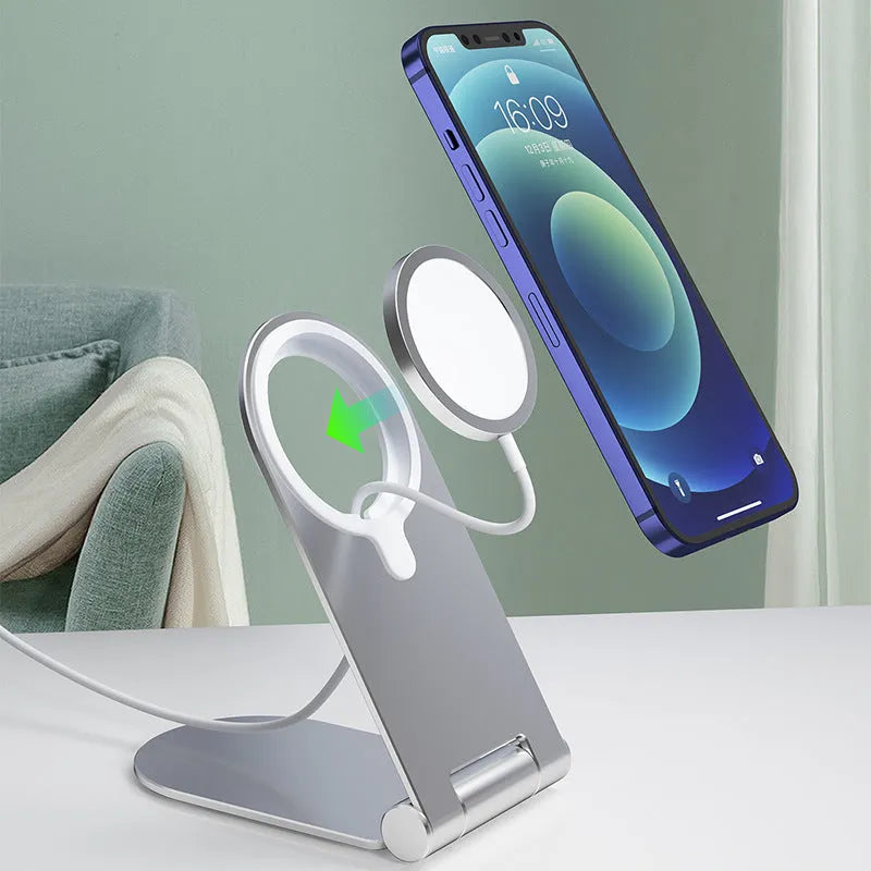 Silver vertical adjustable magnetic phone bracket for iPhone 12 on a desktop