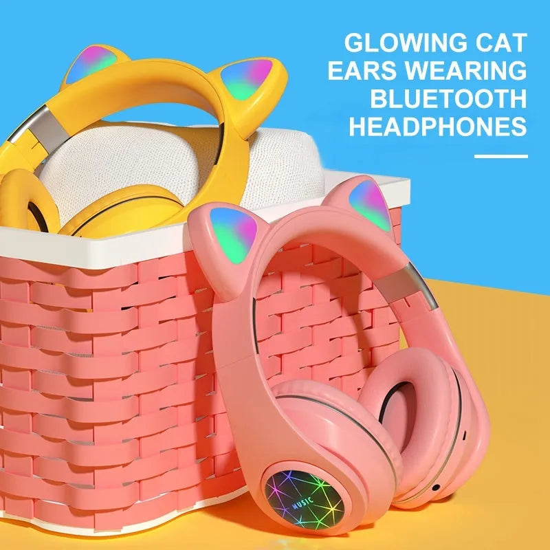 Wireless cat ear Bluetooth headset in multiple colours, showing head-mounted design for sports and music.