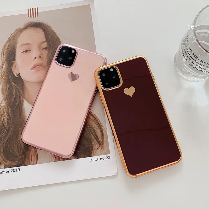 A solid colour TPU back cover case for an iPhone, shown in blue, claret, pink, and green colour options.