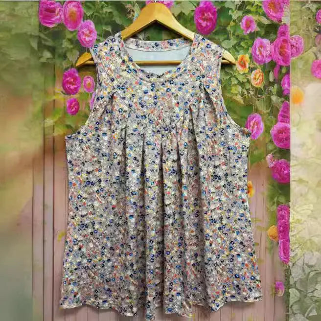 Plus size sleeveless vest with floral print in black or khaki featuring a round neck and loose fit