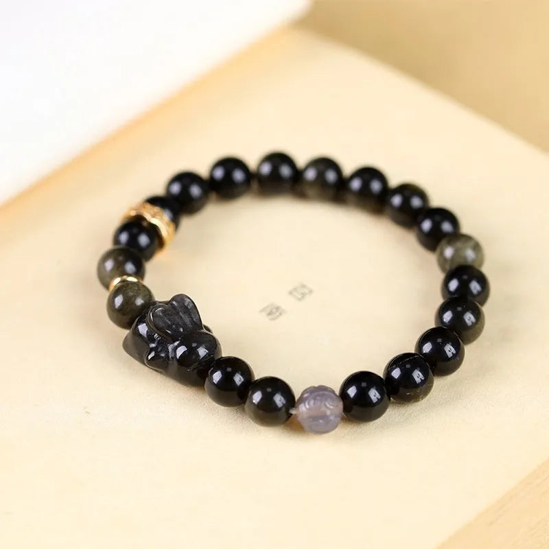 Handmade Chinese national style bracelet with lying rabbit charm and jin yaoshi beads in 8mm size