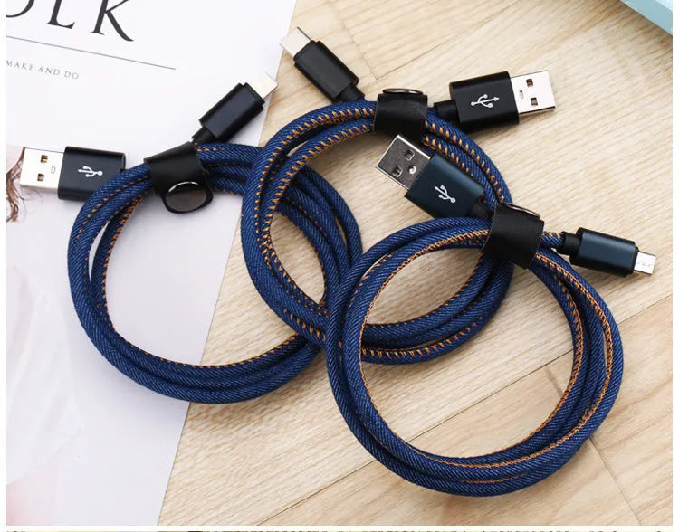 Denim braided USB-C charging cable with aluminium connectors shown in black, blue, and red colour options.