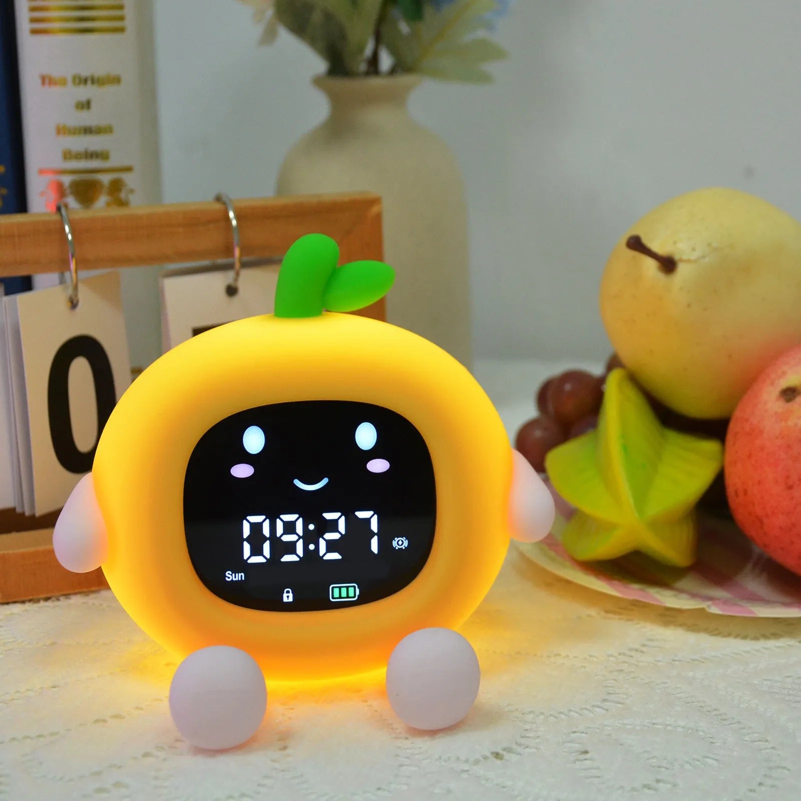 Cartoon lychee alarm clock with white noise and phone holder in silicone shell, over 15mm thick, litchi colour