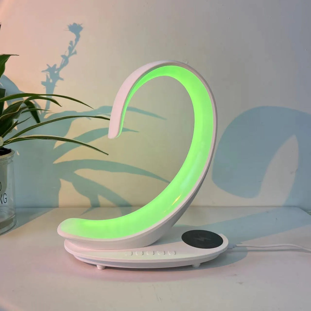 White swan sculpture desktop wireless charger with Bluetooth speaker and colourful LED atmosphere lighting