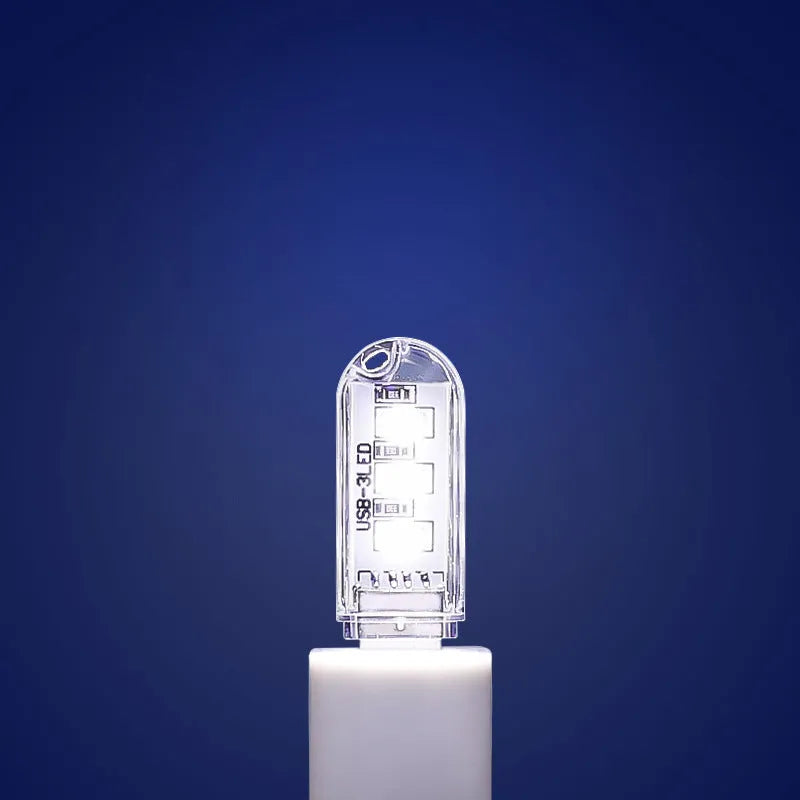 Compact USB-powered LED baby night light with white and warm light options measuring 6cm by 1.8cm
