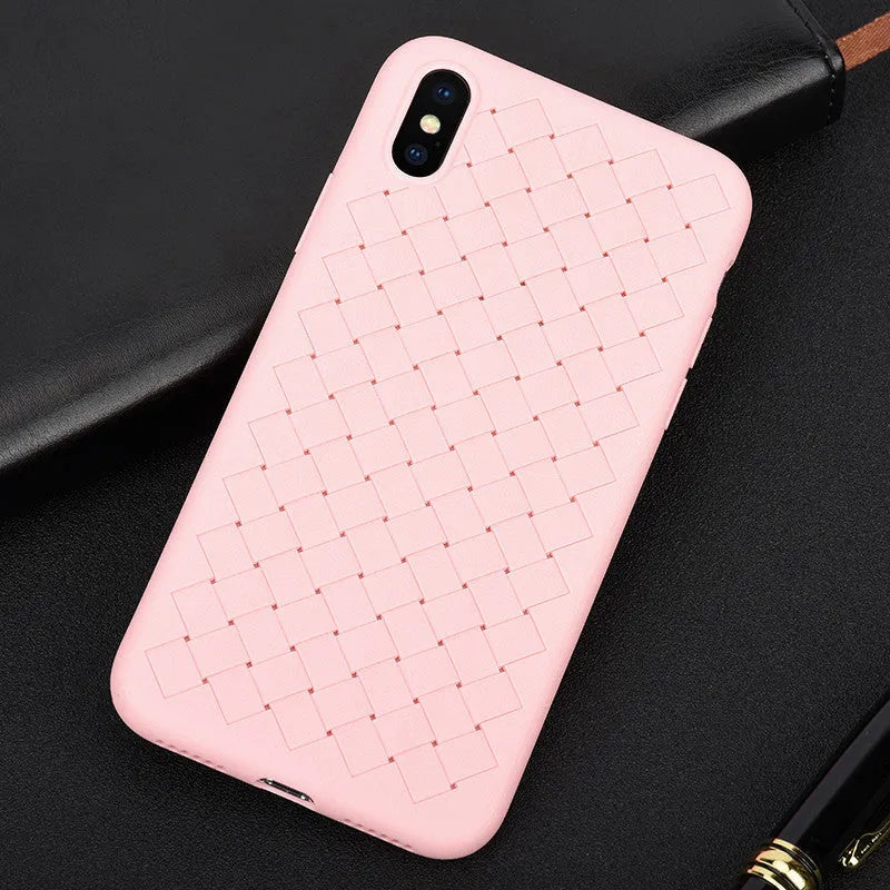 Luxury grid weaving patterned iPhone case with raised edges, shown in multiple colours on a table.