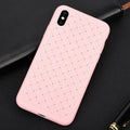 Luxury grid weaving patterned iPhone case with raised edges, shown in multiple colours on a table.