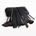 24 piece makeup brush set with wooden colour handles, animal hair and nylon bristles, and PU bag