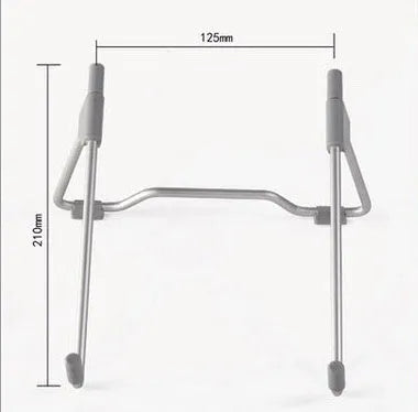 Grey aluminium alloy mobile phone and laptop stand on a wooden desk.