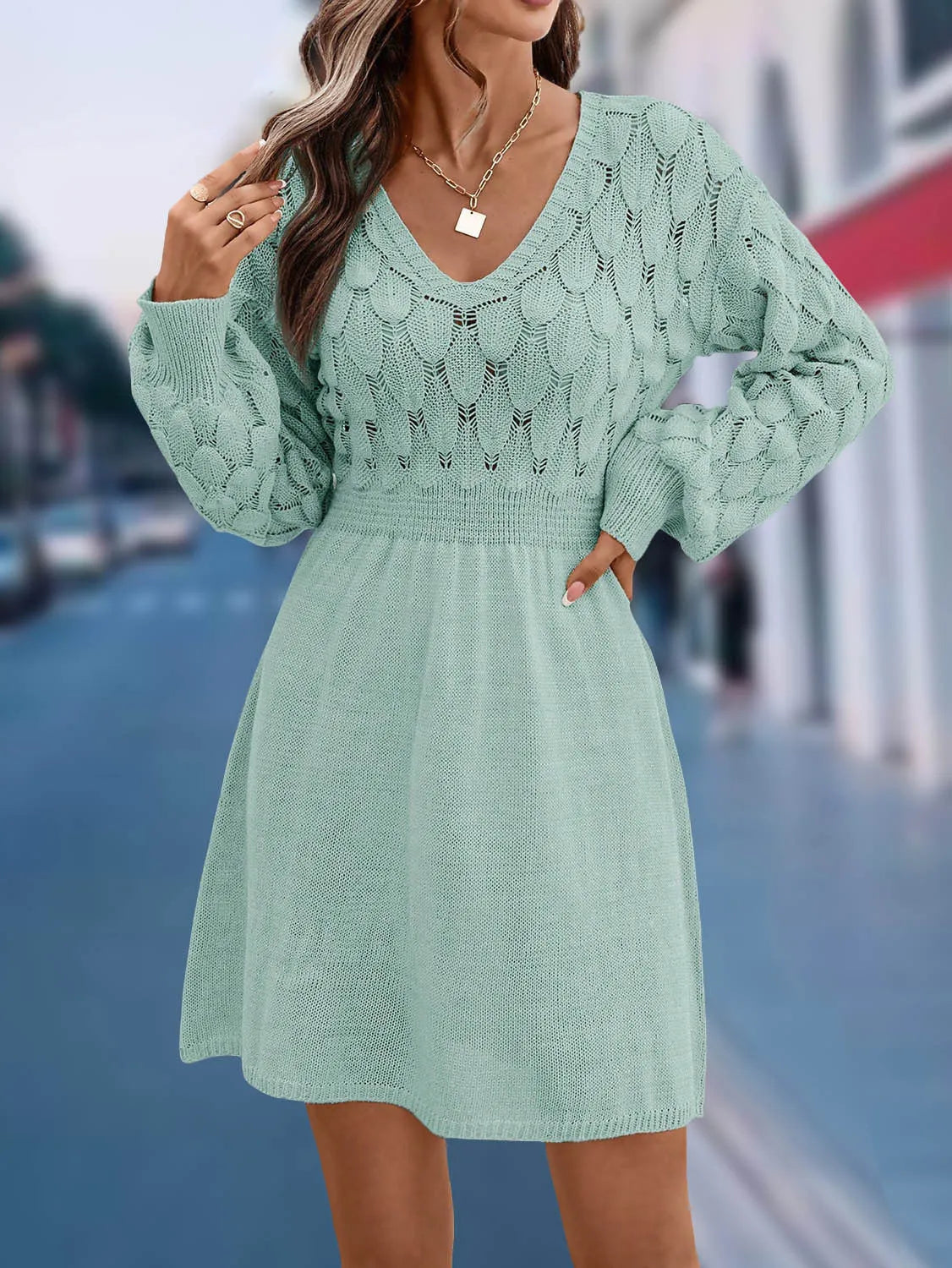 Women's artistic retro acrylic V-neck beach dress with long sleeves, high waist, 3D pattern, in apricot colour.