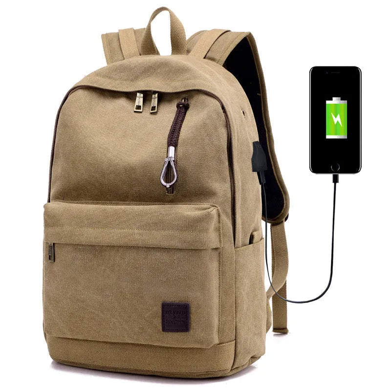 Canvas backpack with USB charging port shown in grey, featuring a laptop sleeve and front zipper pocket.