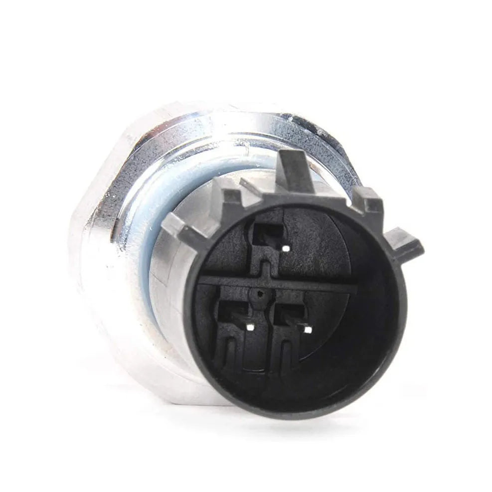 Silver automobile fuel pressure sensor with single port on a white background.