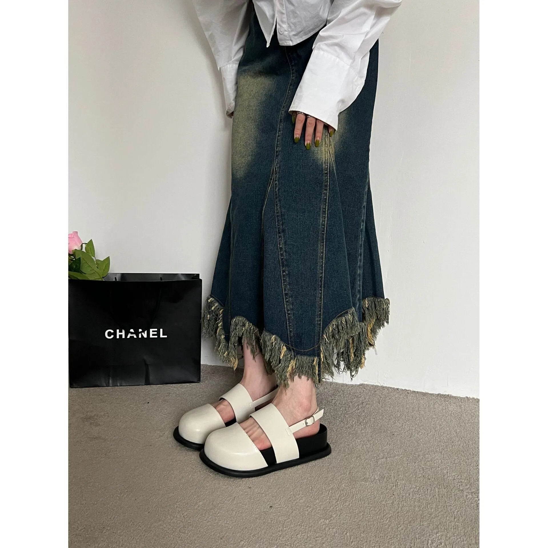Retro closed-toe sandals with an adjustable ankle strap buckle in black, brown, or apricot colour.