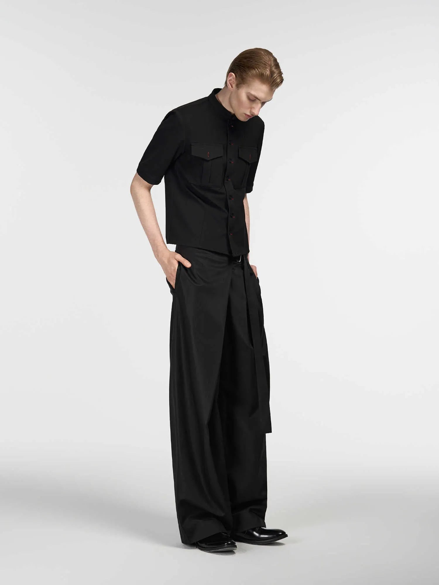 Black women's straight-leg trousers with adjustable waist and single pleat detail