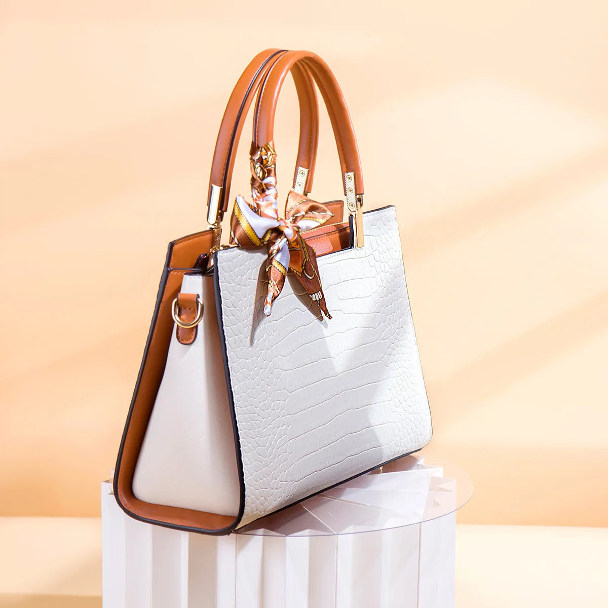 Milky white women's PU leather large-capacity shoulder handbag with internal organisers.