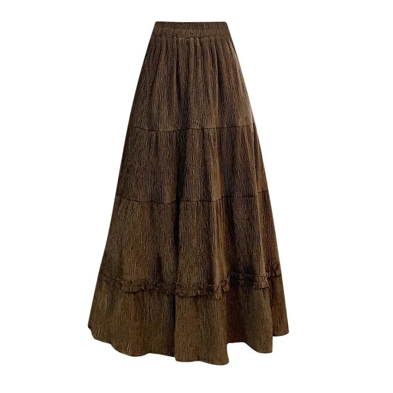 Beige corduroy A-line midi skirt with elastic waistband shown on mannequin