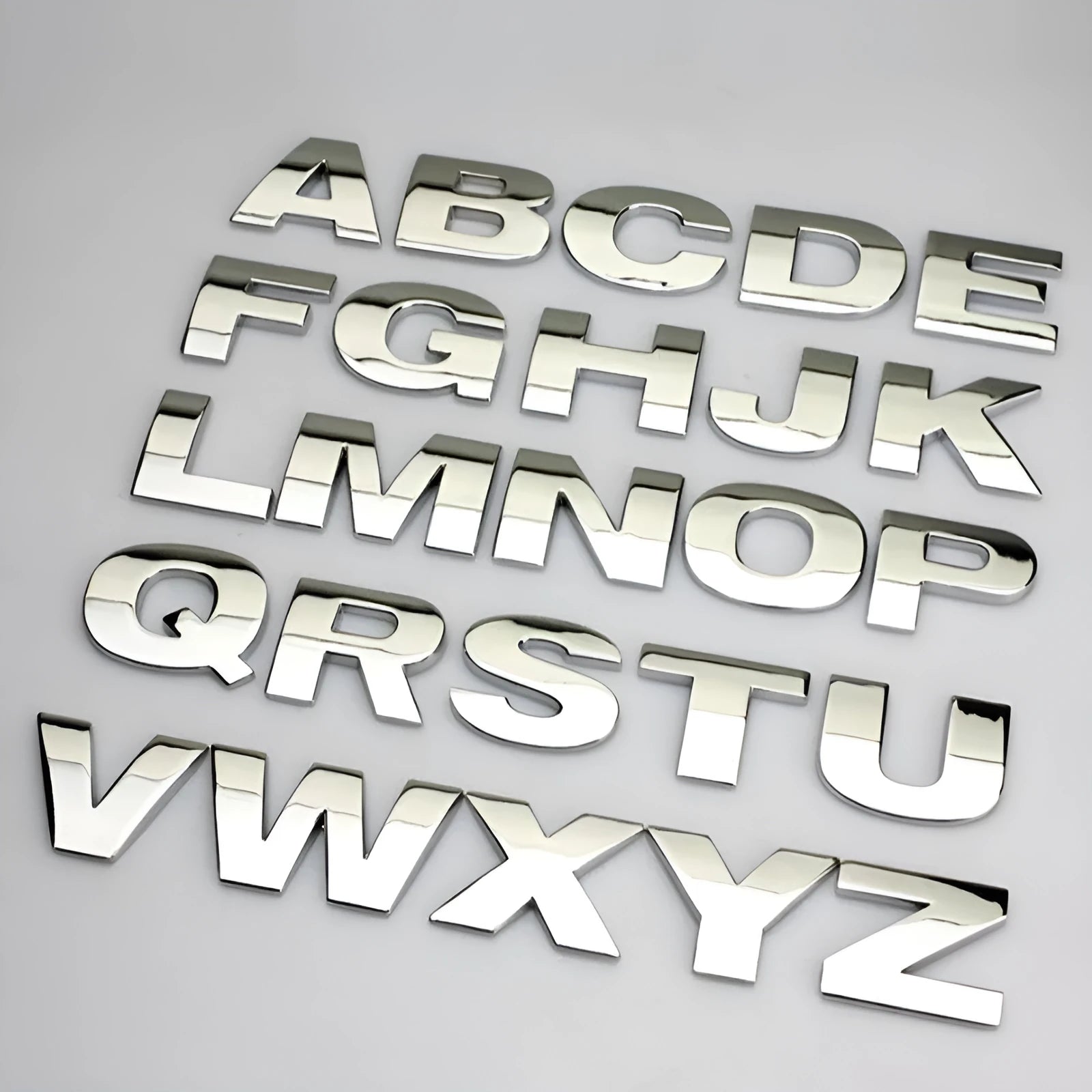 3D metal zinc alloy car bumper sticker letters in black and silver, showing raised 2.5cm design