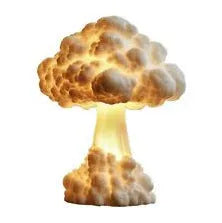 Atomic bomb explosion mushroom cloud shaped USB table lamp on a desk.