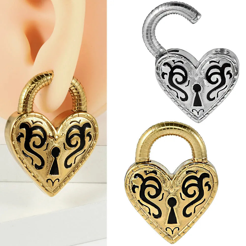 Single stainless steel heart-shaped stud earring for fresh piercings in gold colour.