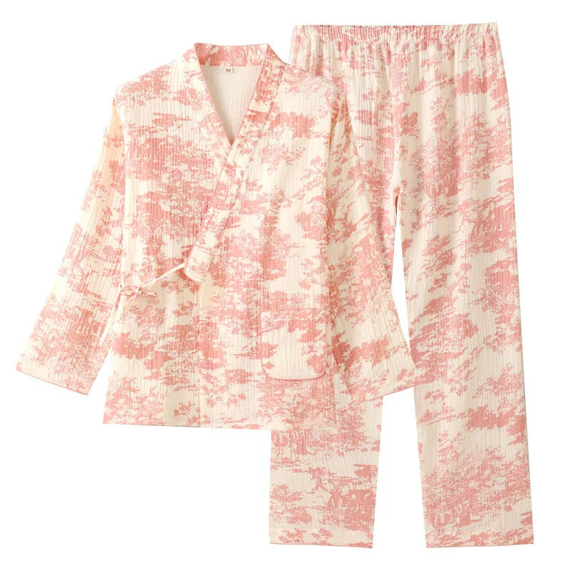 Women's cotton gauze loungewear set showing long sleeve shirt and matching trousers with lace-up detail in pastel colour