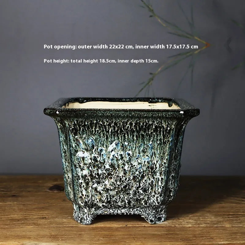Square ceramic decals stoneware flower pot 22cm, green glaze change finish, placed on wooden desktop with small plant inside