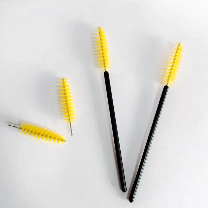 Rigui 50pcs plastic eyelash brush set in black, pink, red, blue, white, yellow and purple