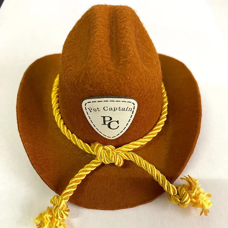 XINGX brown and black British-style cowboy hat for cats on a mannequin head.