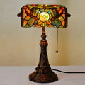 10-inch Tiffany stained glass table lamp with resin base on a desk.