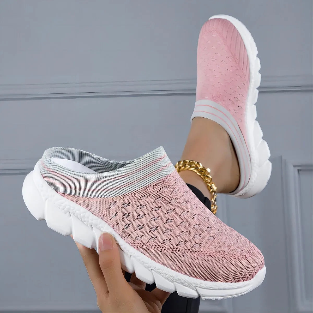 Women's black striped Flyknit casual slipper shoes with hollowed-out design and height increasing sole.