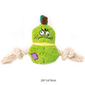 Green and purple interactive dog toy with plush rope knot for tug-of-war and dental cleaning features