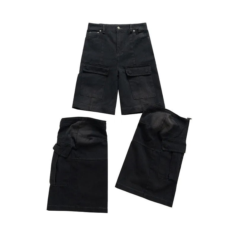 Black washed-out cotton detachable overalls with multiple pockets on a hanger.