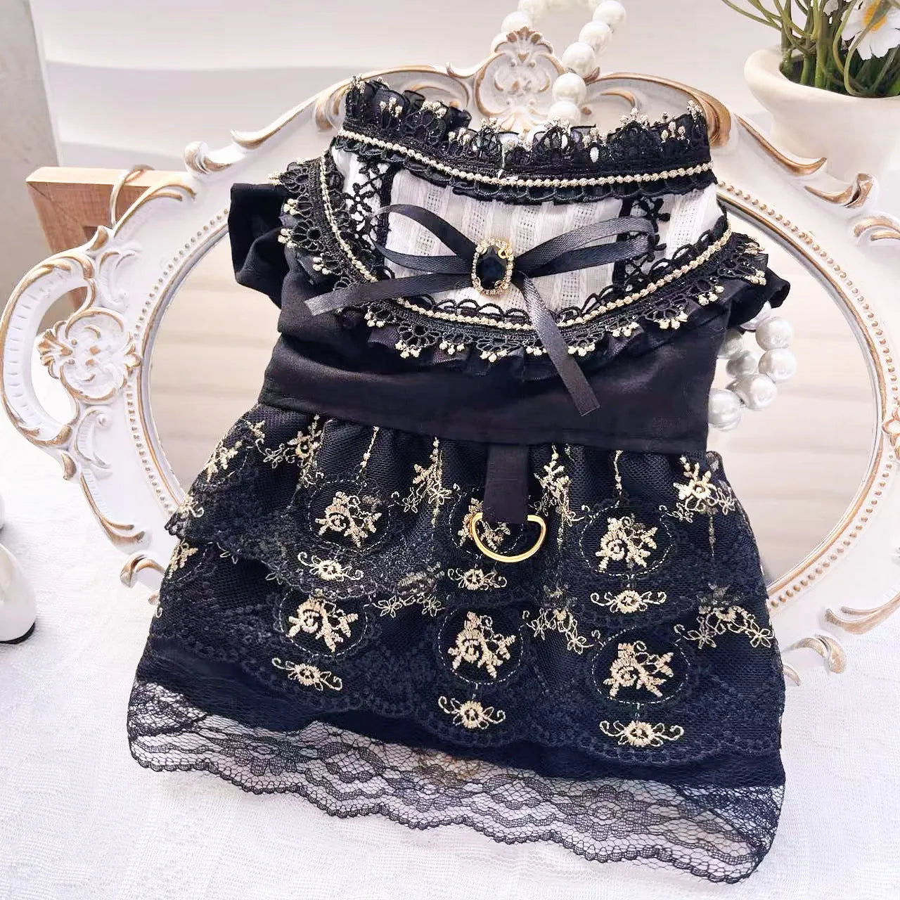 Golden gothic princess style skirt dress for a small dog or cat on a mannequin.