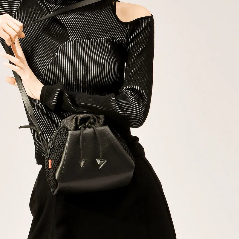 Women's fabric crossbody shell fashion bag with zip closure in Cream, Khaki, or Magic Black.