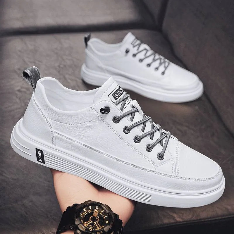 Men's casual white PU shoes with round toe and shallow mouth design on a flat sole.