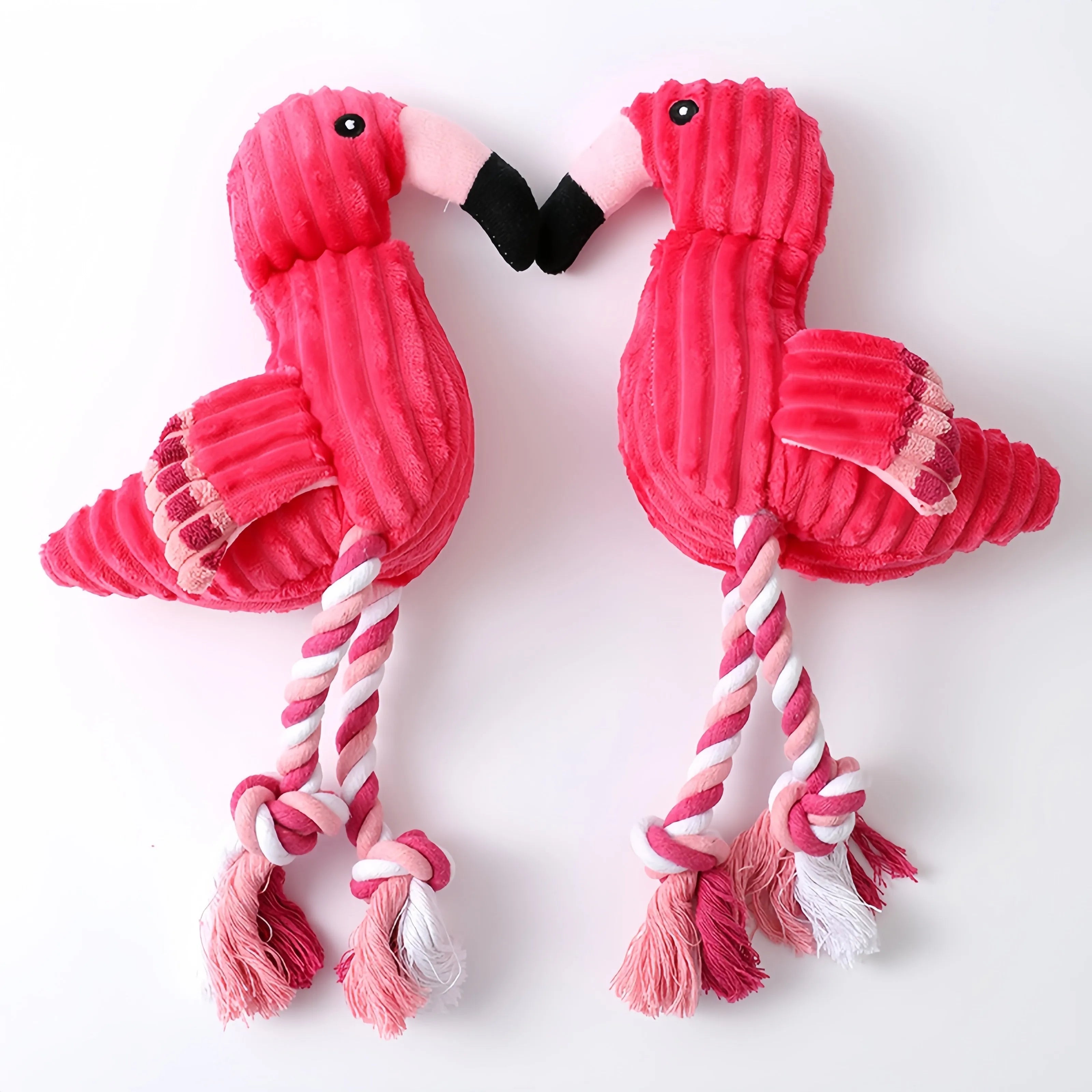 Pink animal-shaped corduroy squeaky dog toy measuring 20cm for small and large dogs