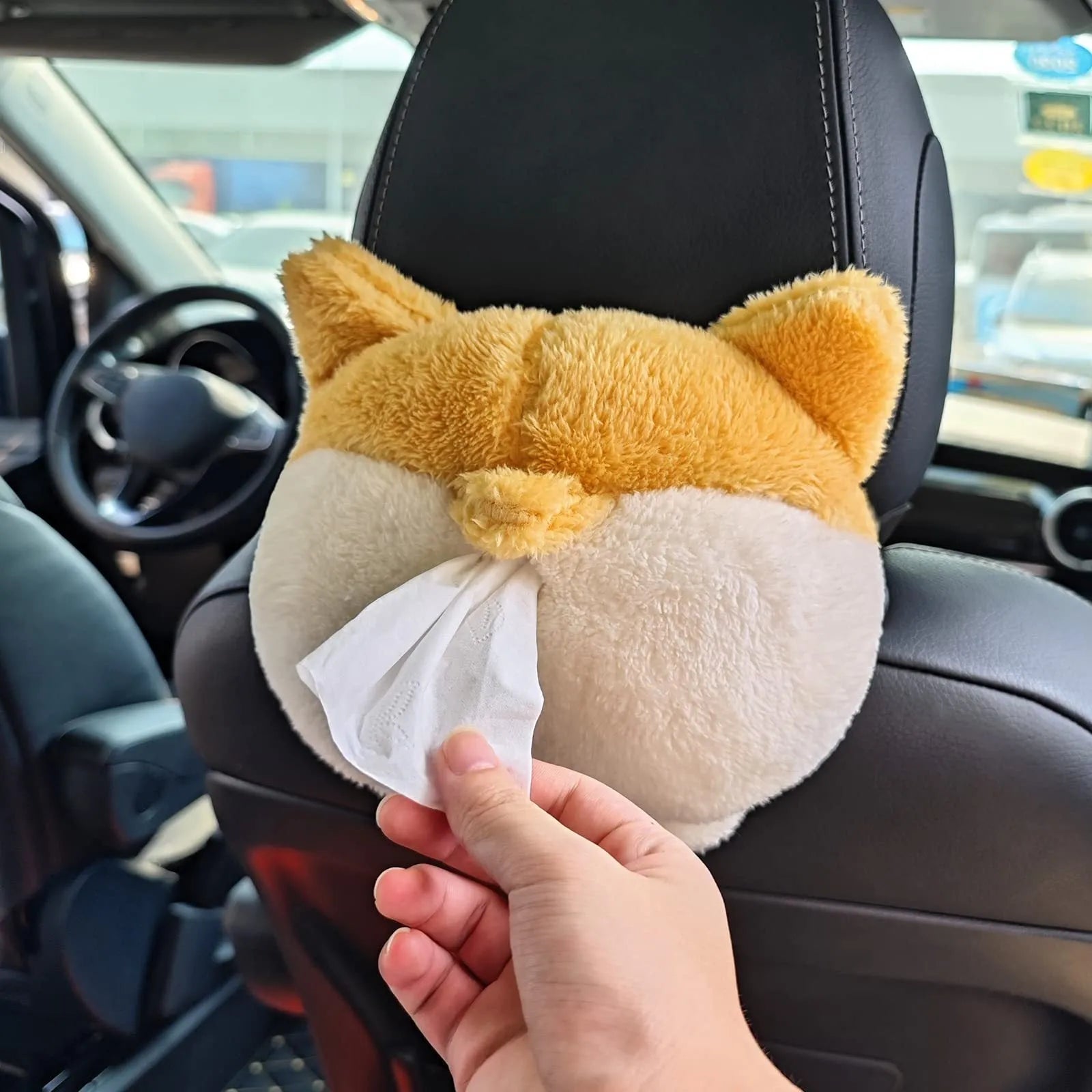 Yellow soft corgi butt shaped tissue box cover with elastic strap for hanging in car.