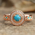Women's geometric turquoise copper ring with rose gold plating and a micro inlaid zircon detail.