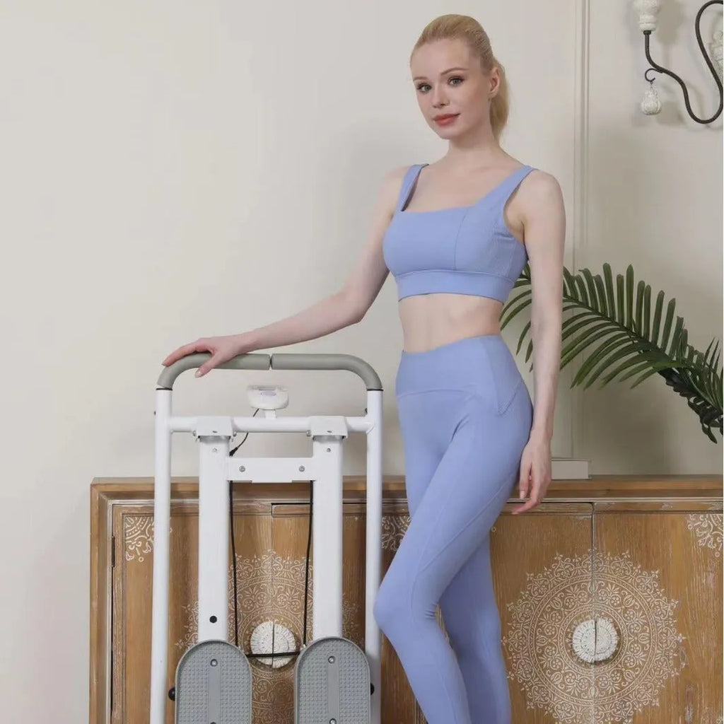 White foldable multi-function treadmill with integrated climbing frame and climbing machine for home fitness