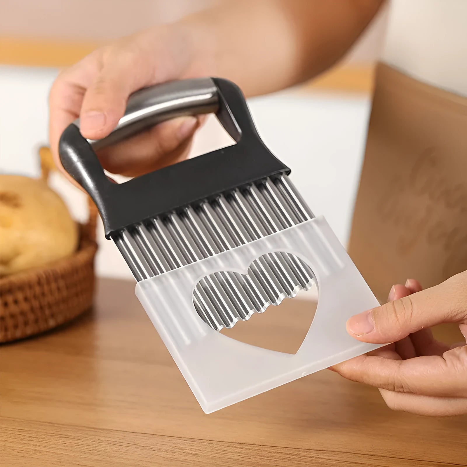 Stainless steel potato wave knife kitchen tool measuring 14cm by 9cm