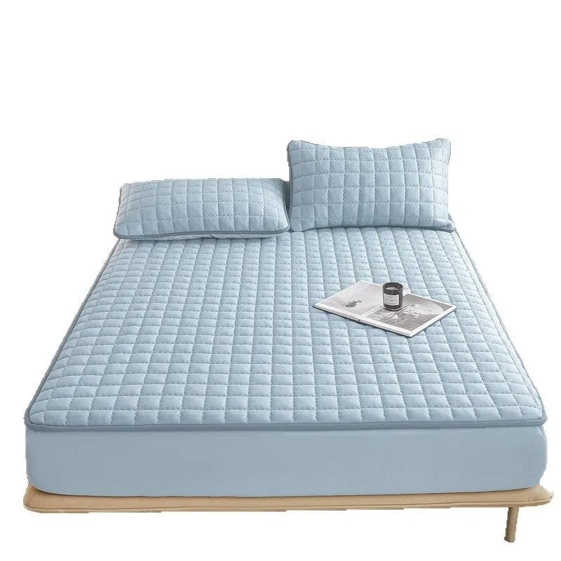 Waterproof washed cotton fitted sheet for bed protection in blue, shown on a UK double mattress.