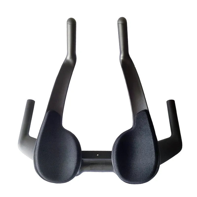 Black carbon fibre time trial bicycle handlebar showing aero extensions and 31.8mm clamp area
