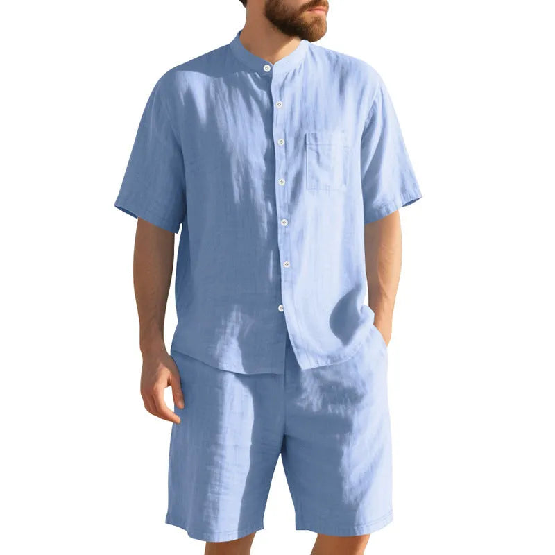 Men's light blue linen blend summer suit with short sleeve shirt jacket and matching shorts on a hanger.