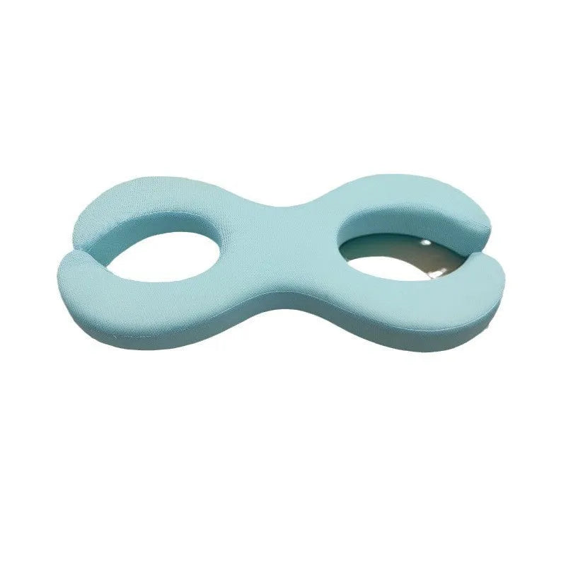 Blue cylindrical memory foam cervical traction pillow for neck support during sleep