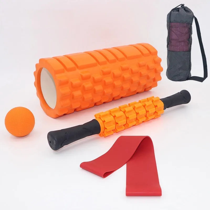 Black foam massage roller measuring 33cm with six separate massage pieces along shaft