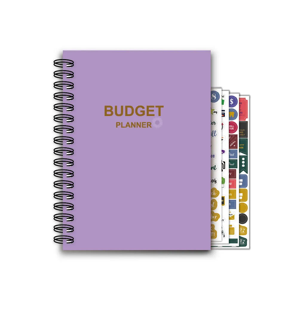 Purple coil-bound budget notebook with pen and stickers for financial planning