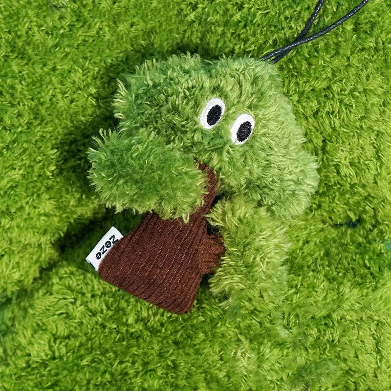 Felt pine tree shaped cat toy with cotton rope hanger and cat mint scent.